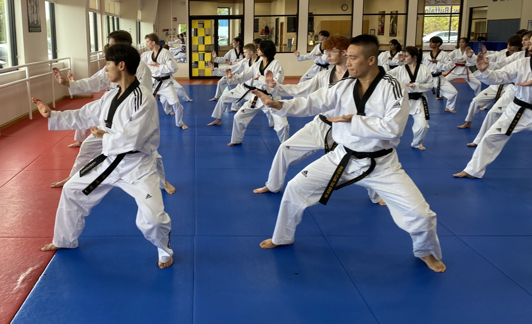 martial arts business marketing seminar attendees taking notes